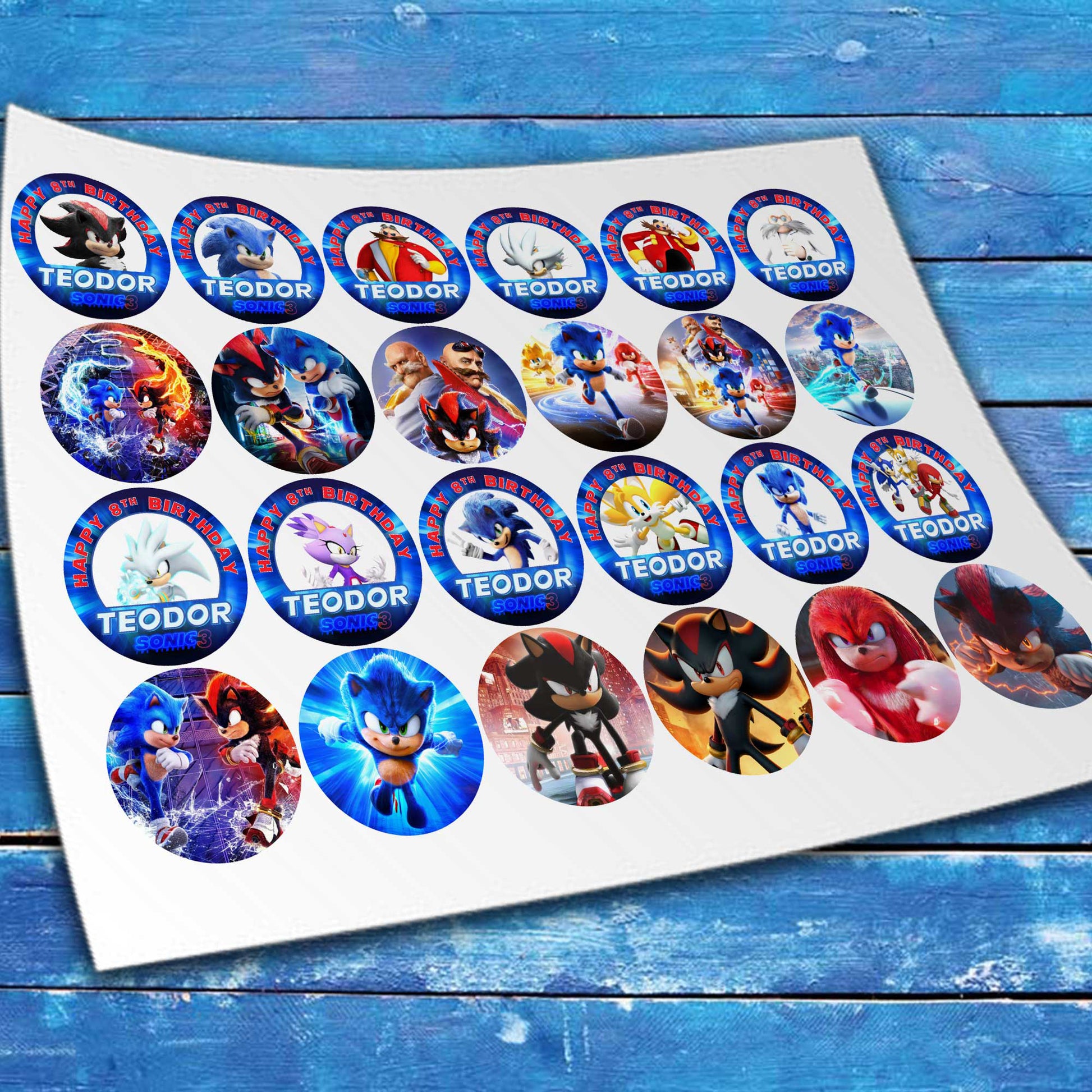 Set of 24 Sonic the Hedgehog edible cupcake toppers on sheet showing precut pieces with white border