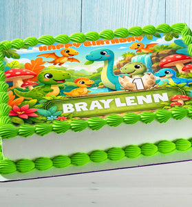 Dinosaur Birthday Cake Topper with name Braylenn and number 1, colorful jungle theme on rectangular cake