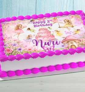 Fairy birthday cake topper with name on pink girls birthday cake