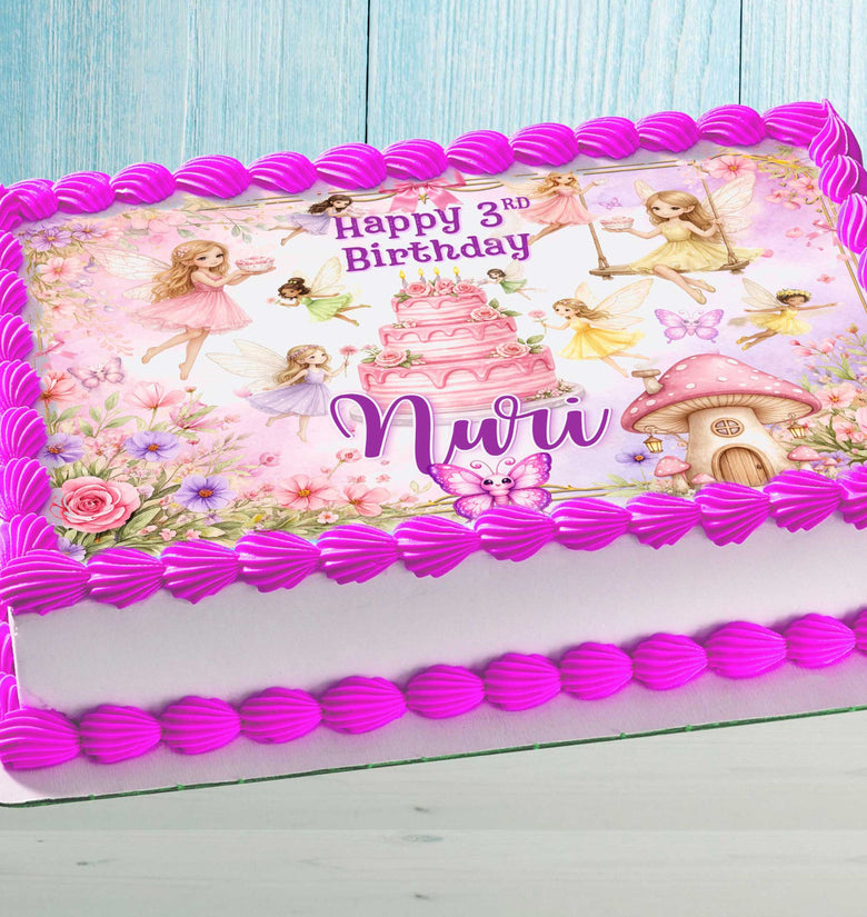 Fairy birthday cake topper with name on pink girls birthday cake