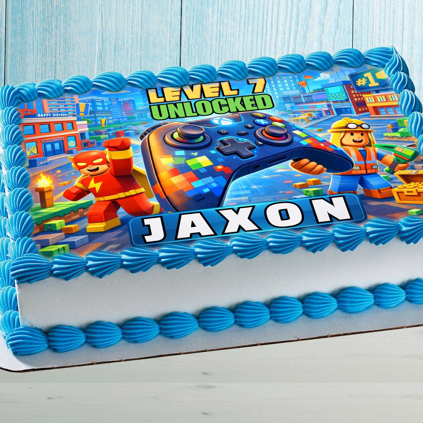 Editable gaming birthday cake topper with colorful game controller and pixel city background, personalized name and age, kids party cake design