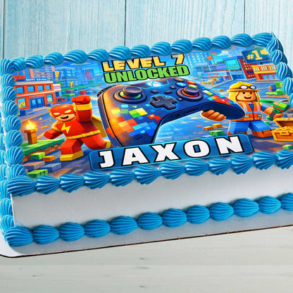 Editable gaming birthday cake topper with colorful game controller and pixel city background, personalized name and age, kids party cake design