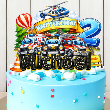 Kids vehicles birthday cake topper on cake with police car, fire truck, ambulance and helicopter, personalized with name and age