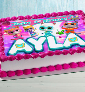 Personalized Kitty Superhero edible cake topper with custom name and age on a sheet cake with pink frosting.