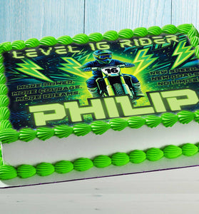 Personalized motocross cake topper on birthday cake, rider theme with name and age