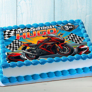 Racing motorcycle edible cake topper on kids birthday cake, colorful racing bike design