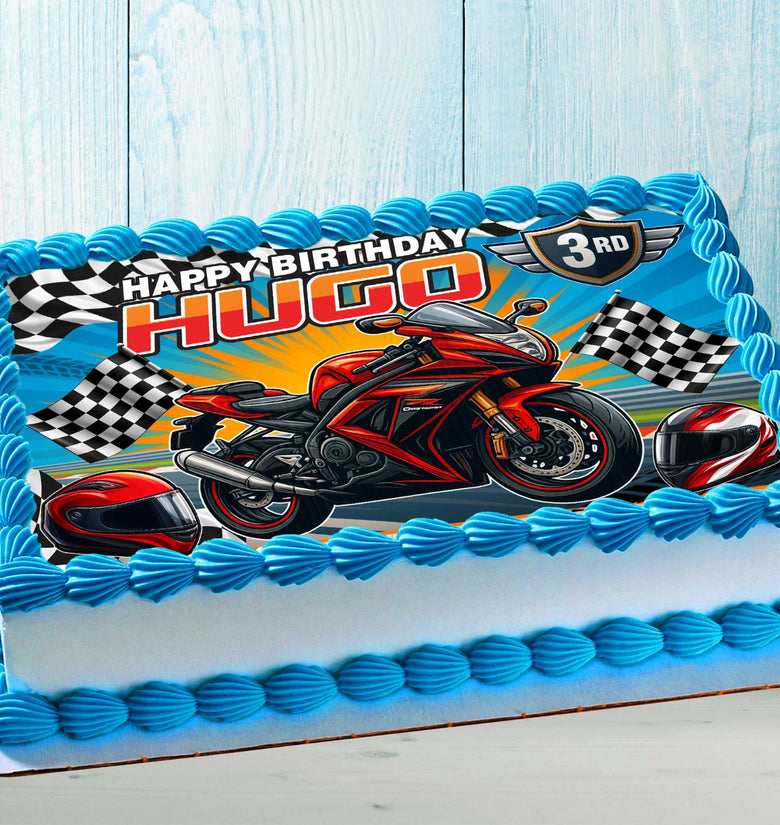 Racing motorcycle edible cake topper on kids birthday cake, colorful racing bike design
