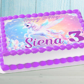 Unicorn birthday cake topper on rectangular cake with purple frosting border
