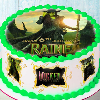 Green witch edible cake topper on a round cake with personalized birthday name and side decorations
