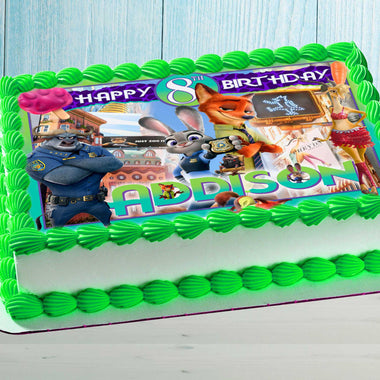 Zootopia birthday cake topper with name and age, rectangular edible image on green frosted cake for kids party