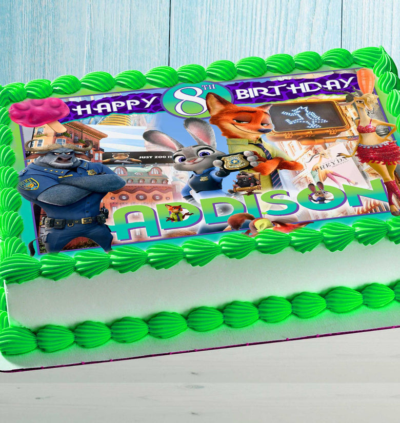 Zootopia birthday cake topper with name and age, rectangular edible image on green frosted cake for kids party