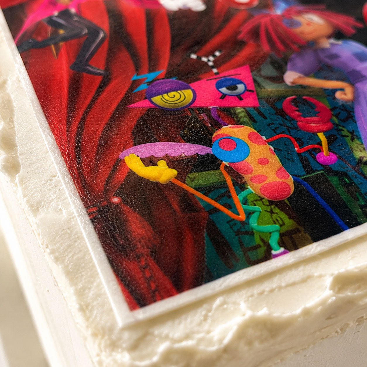 Amazing Digital Circus edible cake topper close-up showing printed sugar sheet texture and color detail
