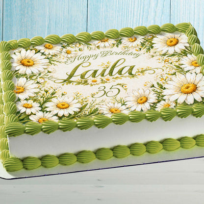 Personalized daisy edible cake topper with custom name on birthday cake floral decoration