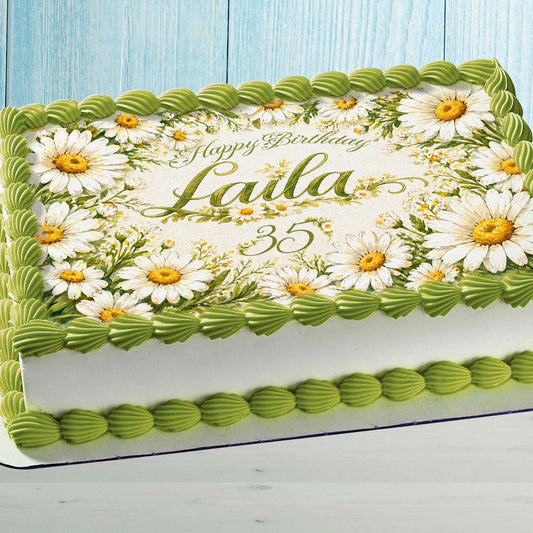 Personalized daisy edible cake topper with custom name on birthday cake floral decoration