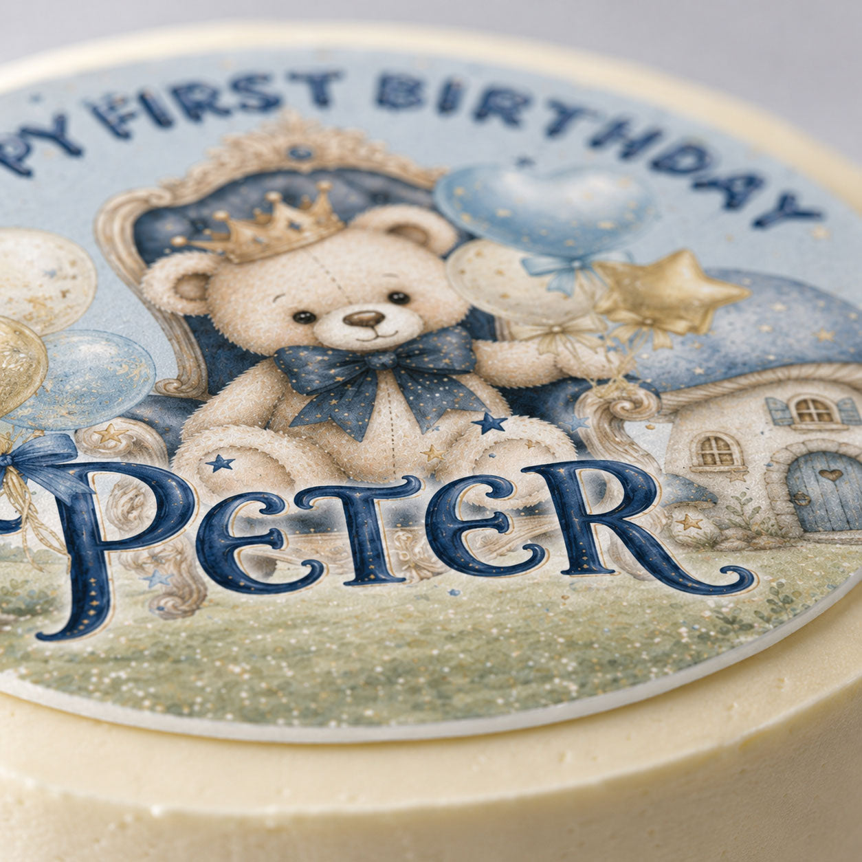 First birthday teddy bear prince edible topper set flat lay with gift and airplane pieces