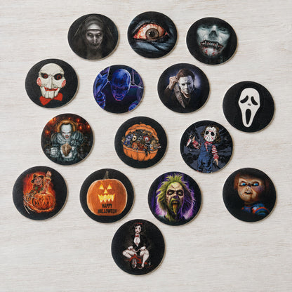 Horror movie themed edible cake toppers in a scattered arrangement featuring classic horror character illustrations