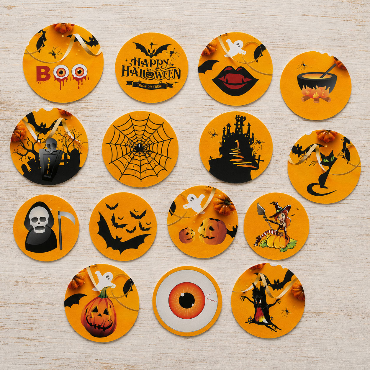Graveyard Halloween edible cake toppers flat lay with haunted castle, cauldron and spiderweb designs