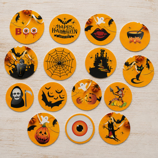 Graveyard Halloween edible cake toppers flat lay with haunted castle, cauldron and spiderweb designs