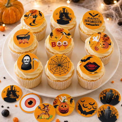Graveyard Halloween edible cupcake toppers on frosted cupcakes with witch and black cat designs