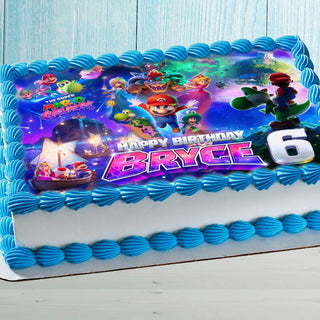 Close-up of Super Mario Galaxy edible cake topper applied to rectangular birthday cake